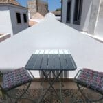 North oriented terrace connected with master bedroom of Casa da Torre, with view on Tavira and citywall tower